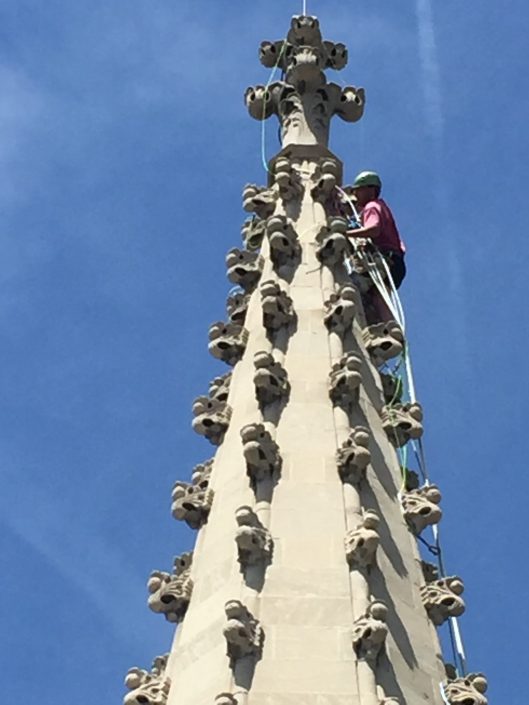 Man climbs church steeple