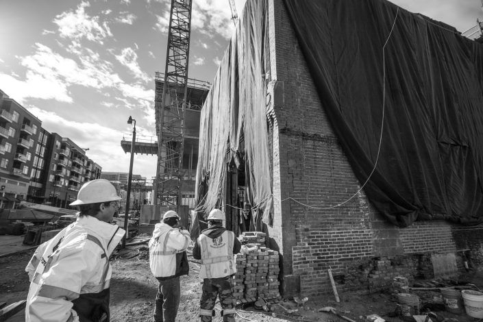 Workers outside the Denver Hose Company Building No.1 Renovation