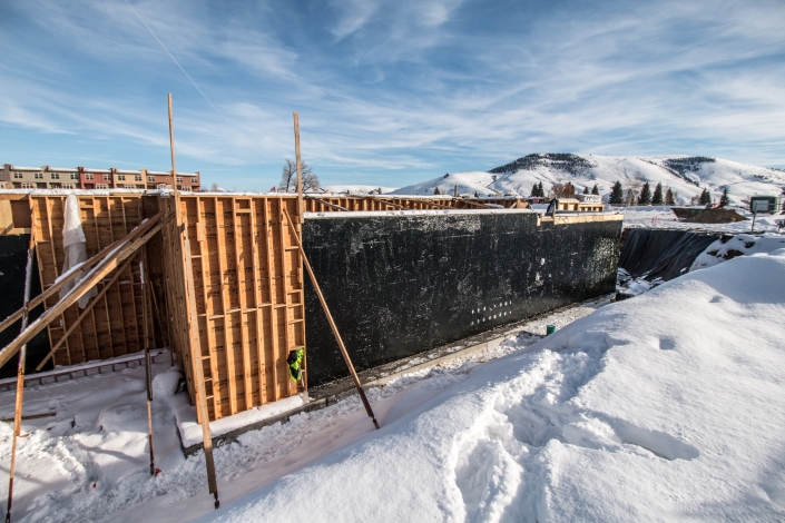 Cold applied waterproofing applied to a building foundation in Gunnison, Colorado